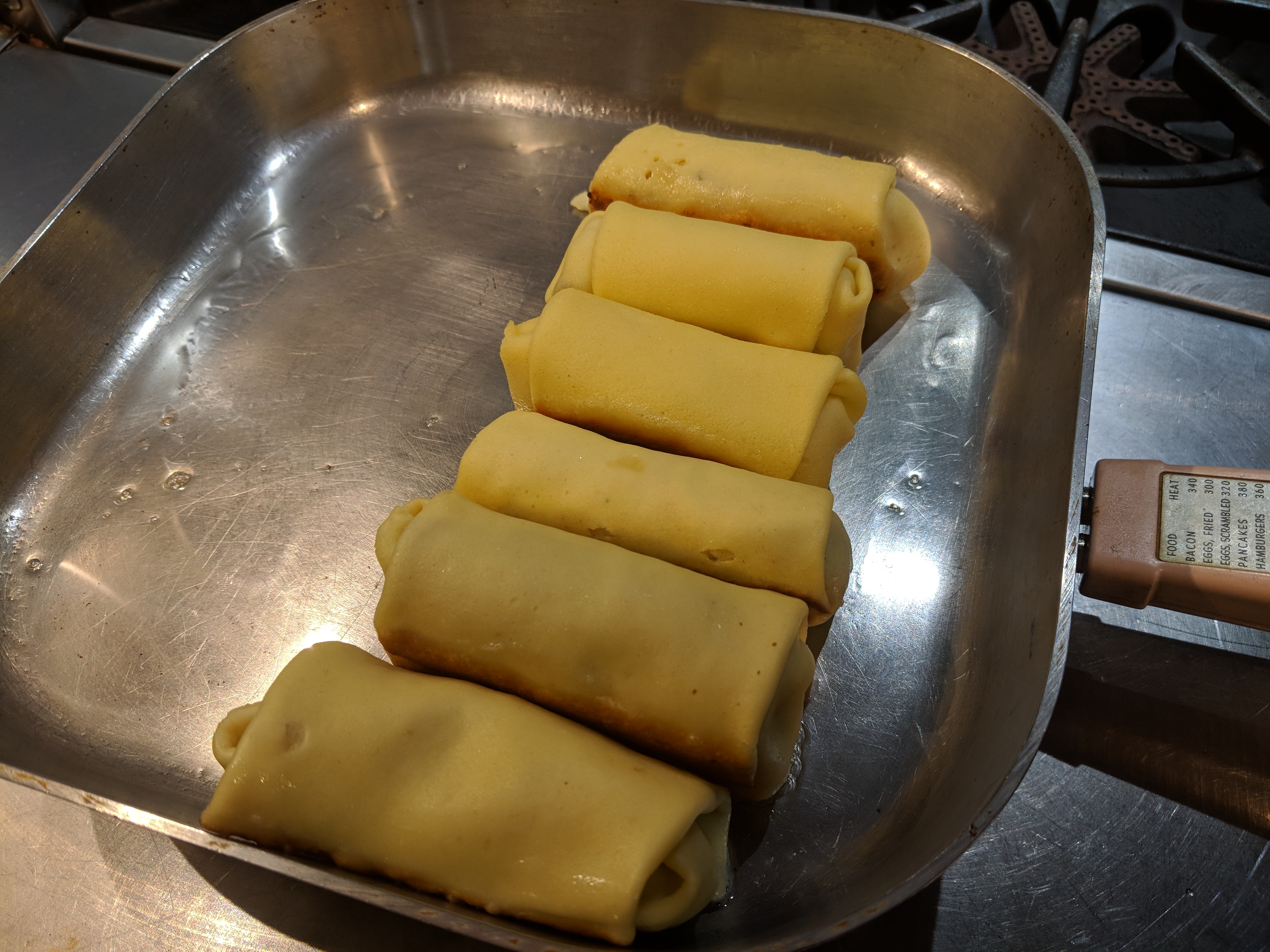 Blintzes, propped up to cook second side